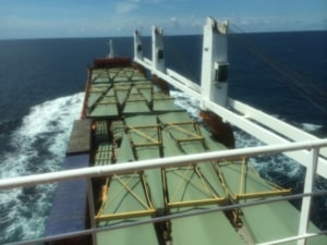 Freight container ship crossing ocean